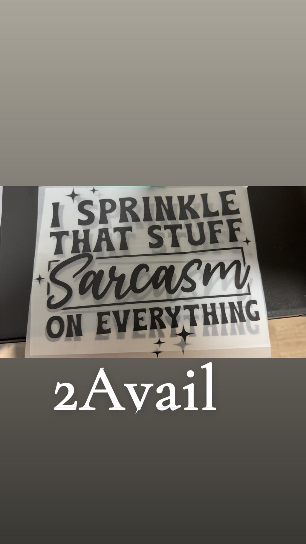 Sticker with text 'I sprinkle that stuff sarcasm on everything' on a gray background
