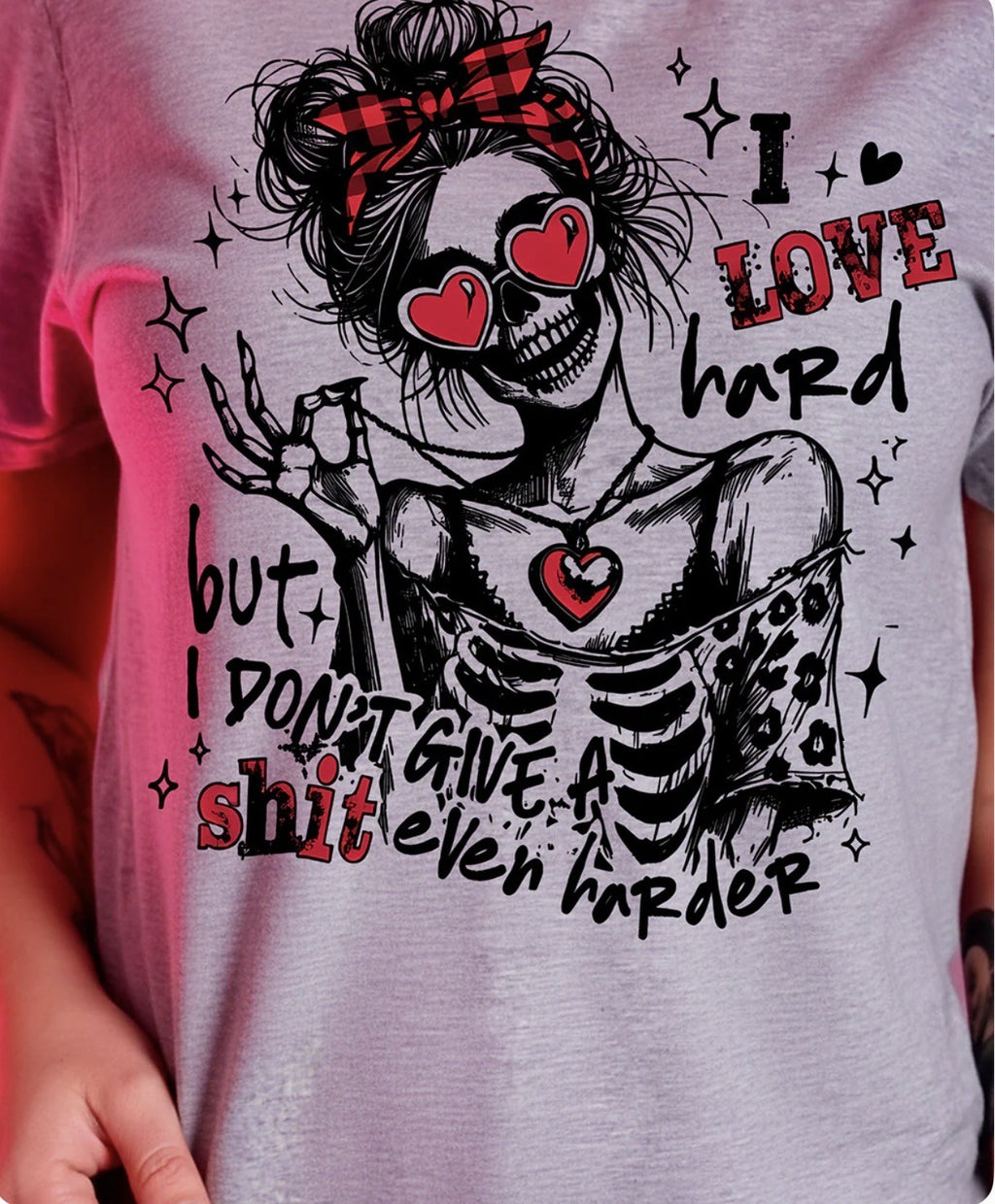 Gray t-shirt with a skeleton design and text on a person wearing it.(1 avail)